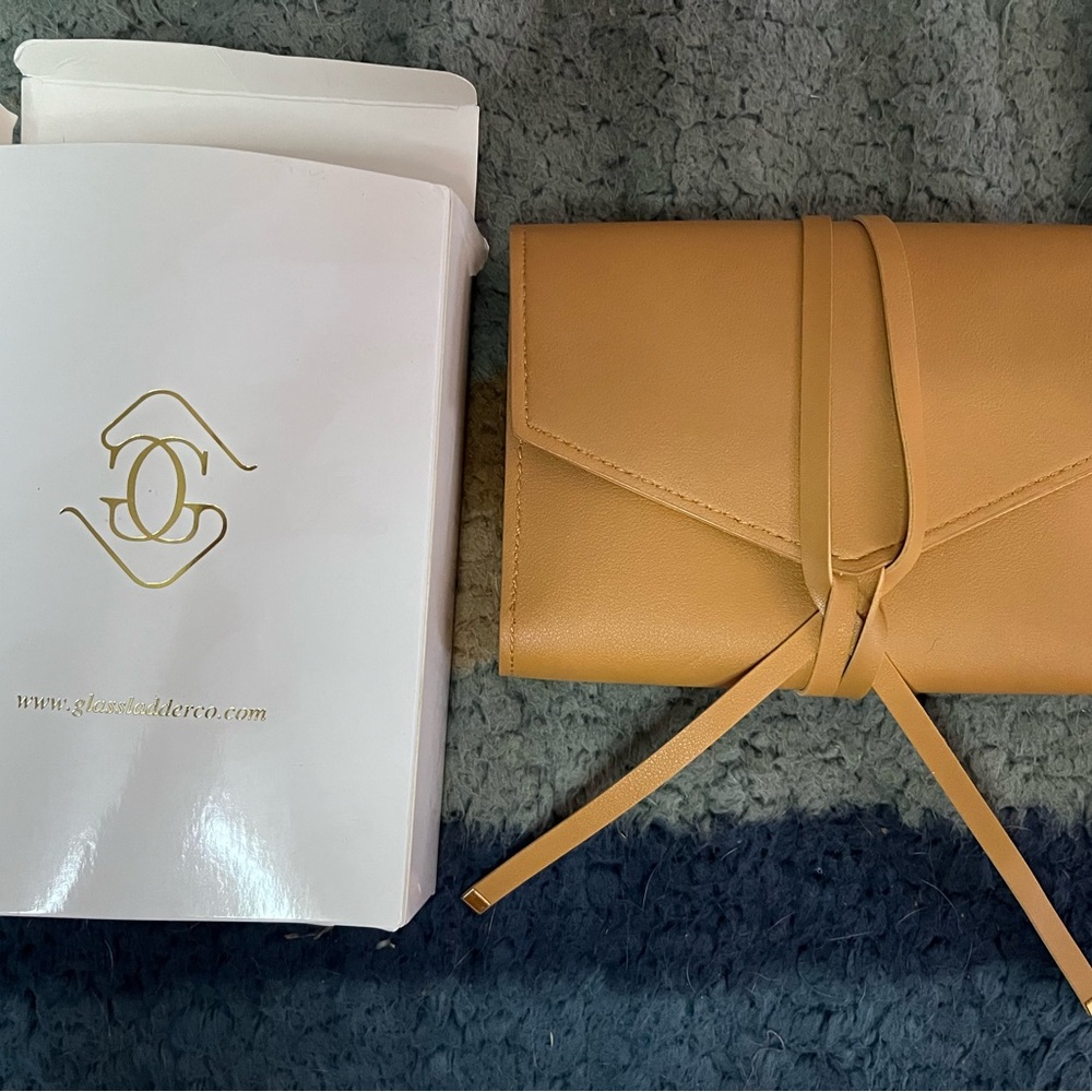 Glass Ladder Co small leather-type purse.  Tan colour.  Brand new with box.
